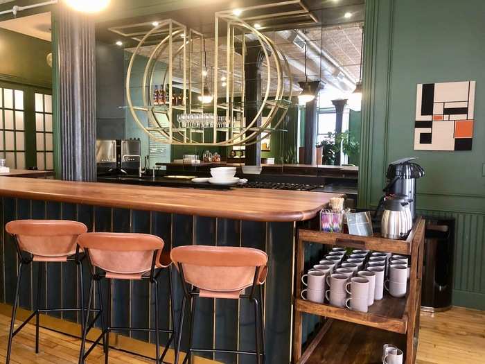 With a wide-length mirror and a modern gilded wine rack, I thought the area easily became a focal point of the room — a perfect place to have a conversation.