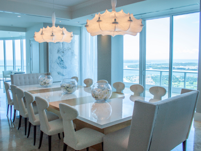 The formal dining room stuck to the white-and-marble theme.