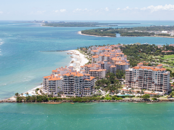 ... as well as Fisher Island, the richest zip code in the US, where the average income is $2.2 million and the beaches have sand imported from the Bahamas.