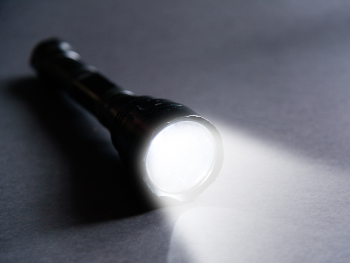 3. A flashlight with extra batteries.