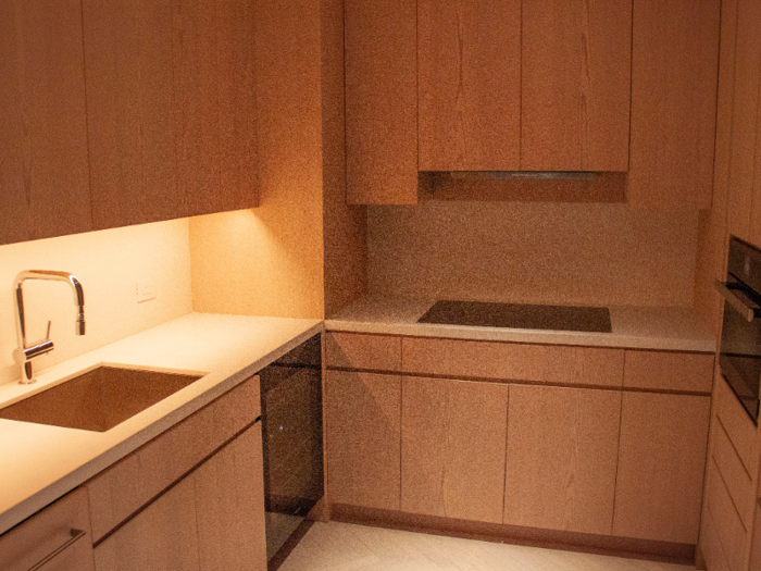 ... and even a kitchen, complete with an oven, range, and sink.