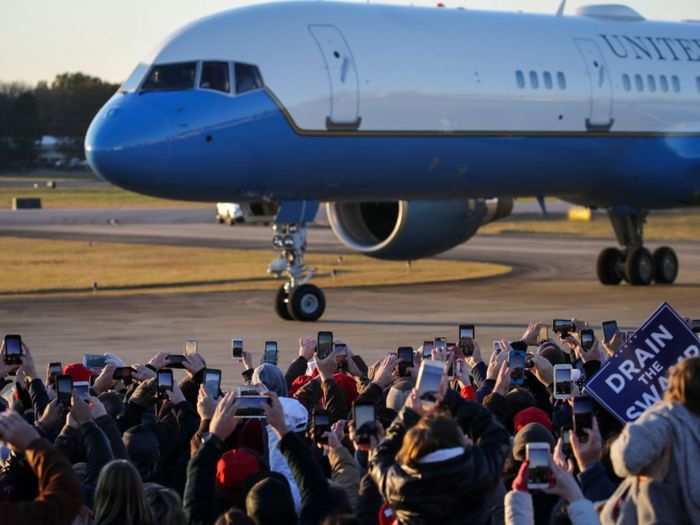 Sometimes Air Force One lands to a public audience; other times it lands for a reception with the hosting leader.