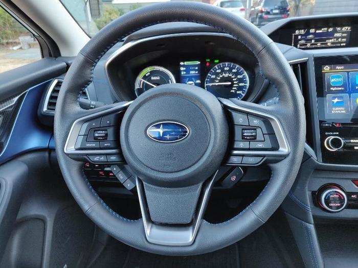 In front of the driver is a heated leather-wrapped steering wheel with controls for everything from the audio system to the drive mode selector. The buttons are clearly labeled and thoughtfully placed.