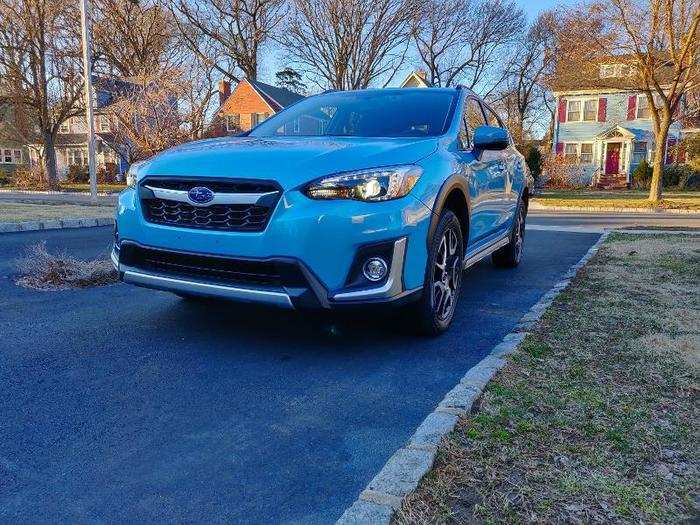 Aesthetically, the hybrid Crosstrek is more or less identical to its conventional siblings. Only the presence of a charging port, blue headlight projector rings, silver body accents, and a few hybrid decals set it apart.