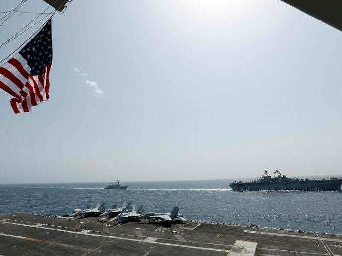 The recent exercises in the Arabian Sea, which involved air-to-air training, steaming in formation and maneuvering, and establishing joint communications to rapidly create a suitable command and control environment, "are a demonstration of the steadfast commitment of the Navy to protect the United States, deter conflict and preserve strategic interests around the world," the Navy said in a statement.