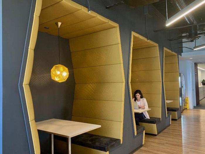 Booths in the kitchen were designed to eliminate noise, providing quiet areas for eating and working.