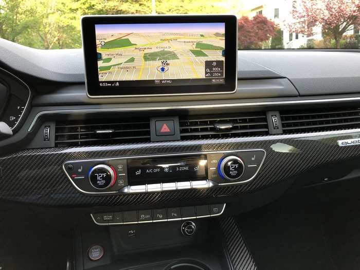 The center-mounted infotainment screen runs Audi