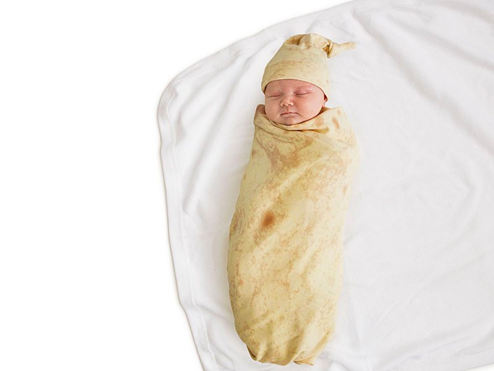 A blanket that makes his baby look like a burrito