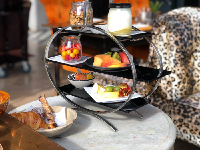 But the joke was on me. This was no appetizer, this was a perfectly fine breakfast for two: a carousel-looking sculpture adorned with two servings of flavored yogurt, muesli, sliced fruit, berries, a cheese plate, and smoked salmon.