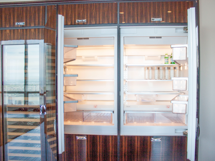 In addition to a Sub-Zero wine cooler, the kitchen comes with dual built-in refrigerators.