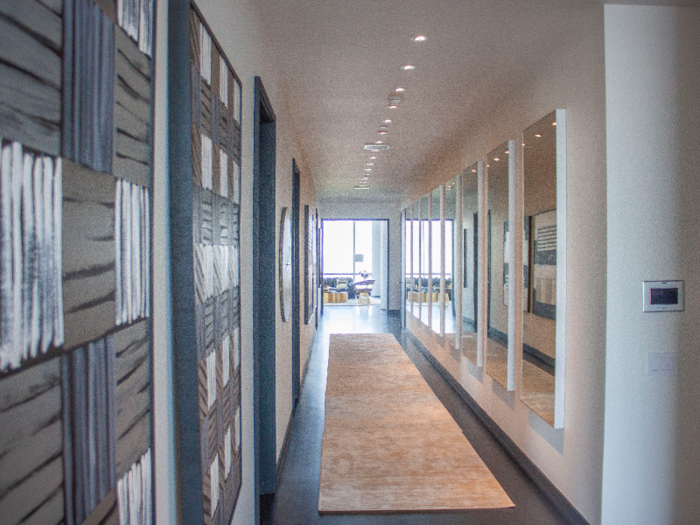 A long hallway leads from the great room to the bedrooms. The residence would be ideal for an art collector, Blackmon told me.