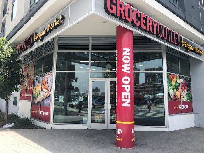 The street entrance to this Grocery Outlet was boldly branded in red and yellow with inviting graphics. Let