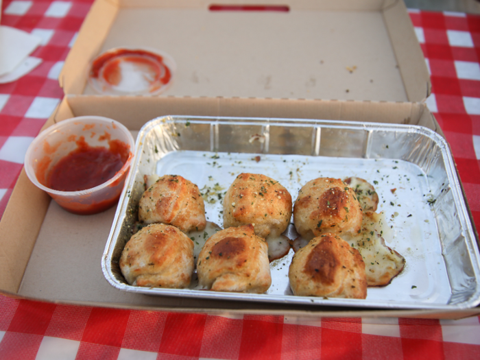 The dish comes with 10 garlic knots filled with melted cheese and encrusted with garlic and parmesan.