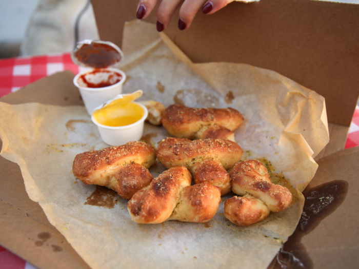 The garlic and marinara dipping sauces from Domino