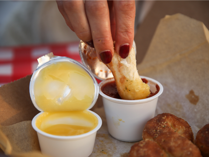 The dipping sauces were priced similarly — Domino