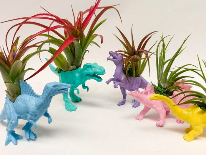 Playful dinosaur planters