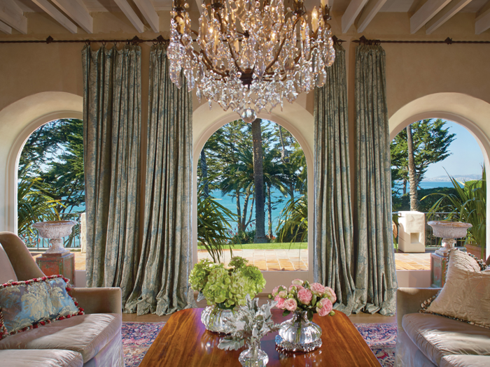 There are several large sitting rooms, all of which include chandeliers.