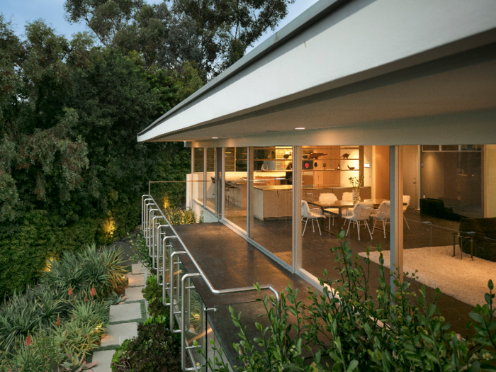 The modernist house, built in 1954, was previously asking $13.5 million.