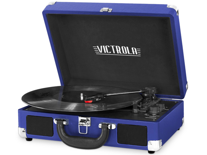 A vintage-style turntable with modern music playing capabilities