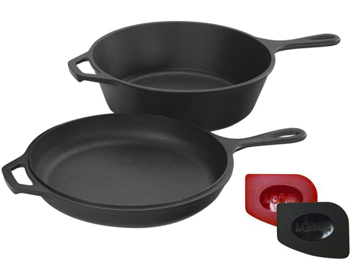 A cast-iron skillet and Dutch oven for campfire cooking.