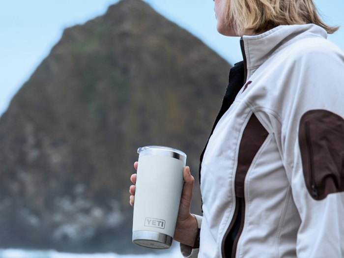 A stainless-steel, vacuum-sealed mug with a magnetic lid.