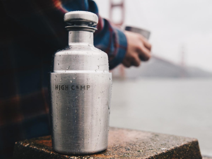 A classy, stainless-steel flask with a magnetic, double-walled cup