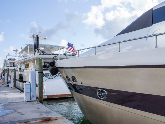 Luxury yachts were clustered at several points along the waterway on Collins Avenue.