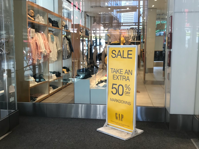 There was an extra 50% off sign in the entryway. The sales associates were quick to alert the handful of shoppers to the sale as they browsed at 11 a.m.