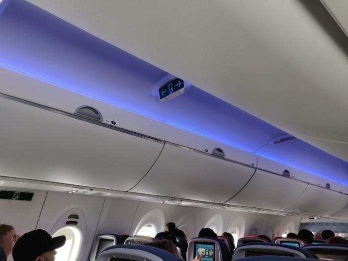 During our flight, the cabin was bathed in blue mood lighting.