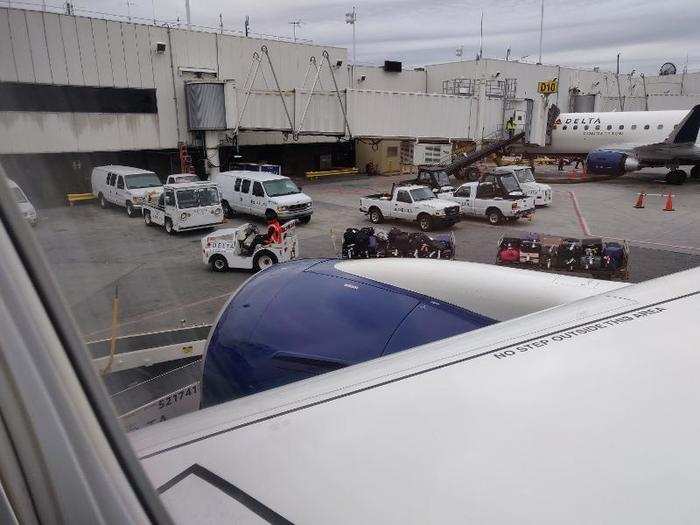 Here come our checked bags! Unfortunately, our flight had been delayed once again. The pilots announce over the intercom that the mechanics are attempting to fix a valve of some sort.