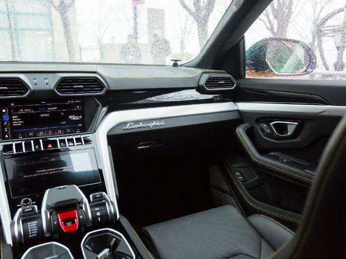 The interior conjoins sportiness — the yellow topstitched leather, for example — with a fighter-plane cockpit vibe. One of my passengers succinctly described how the Urus differs from other Lambos: "More legroom." The front seats are both heated and cooled.