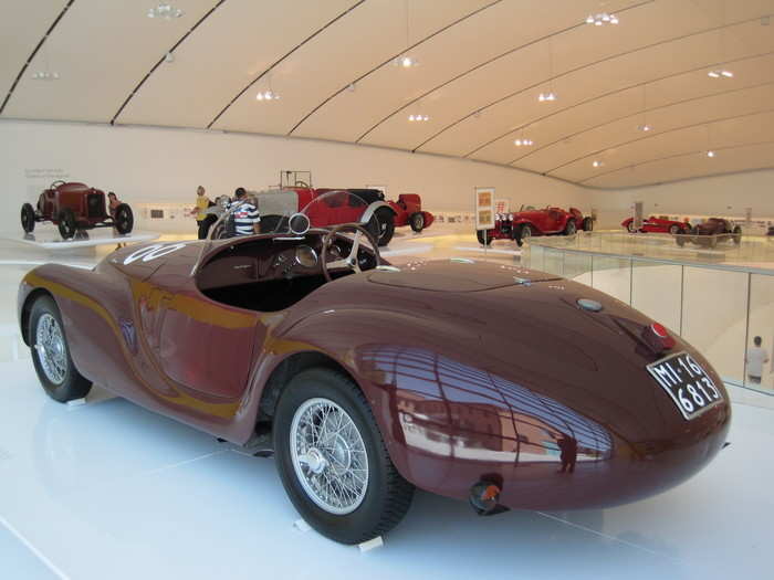 AAC built two 815 cars in 1940. Both were prohibited from carrying the Ferrari name due to a non-compete agreement between Enzo and his previous employers. The agreement prohibited Ferrari from using his name in relation to races or race cars for at least four years.