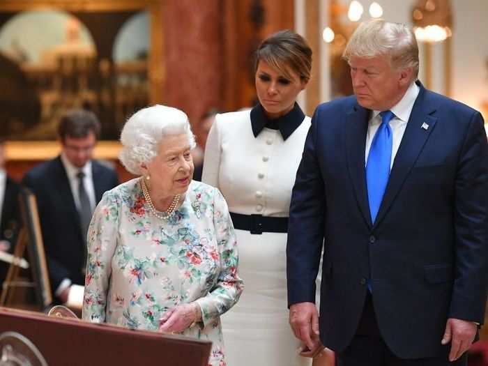 The first couple headed inside the palace with the queen to view historical artifacts and artwork in the Royal Collection.