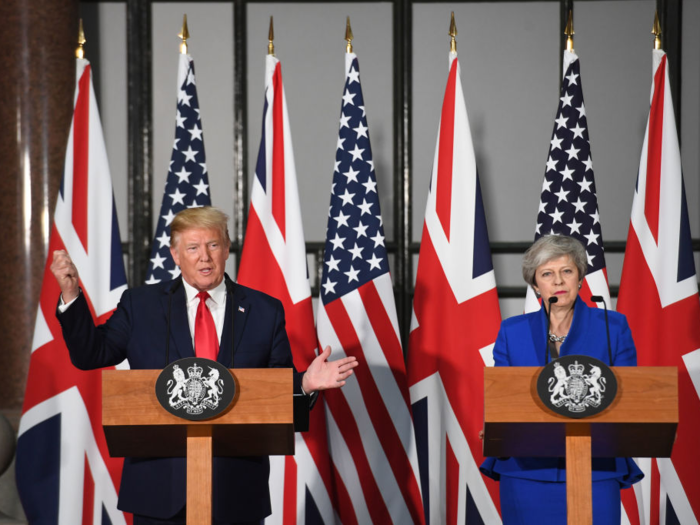 Speaking in a press conference alongside Prime Minister Theresa May, Trump dismissed the protests as "fake news."