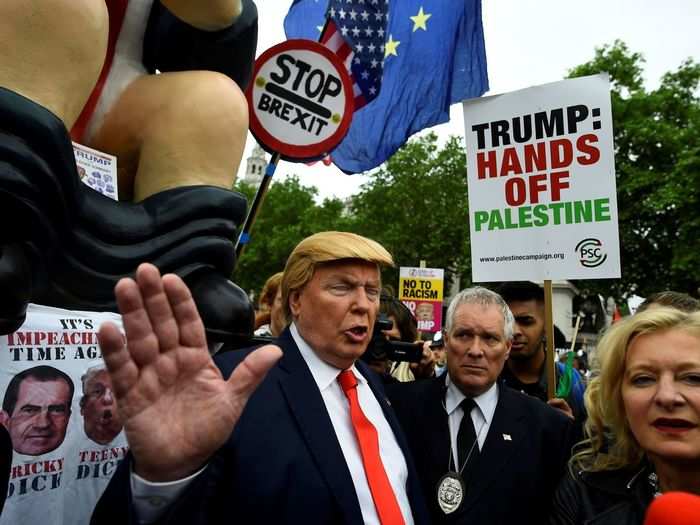 Much of the protest was more comical than fiery, as a Trump look-alike marched along with the crowd.