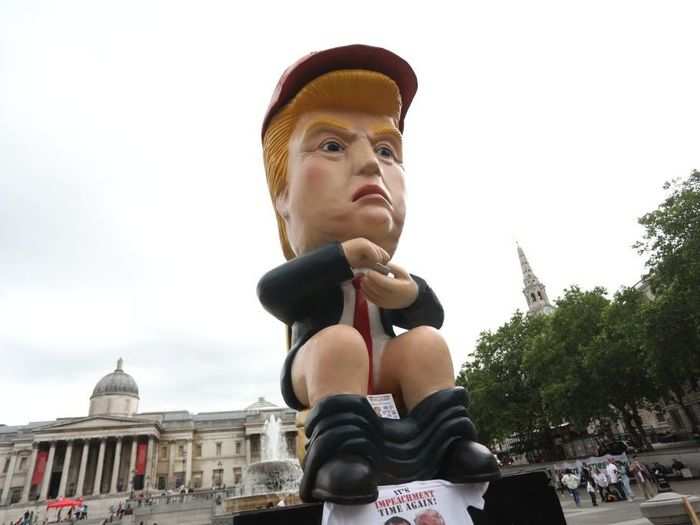 The cornerstone of the protests in Trafalgar Square was a 16-foot robot, which depicts Trump on a golden toilet using a smartphone to tweet and repeating some of his choice phrases.