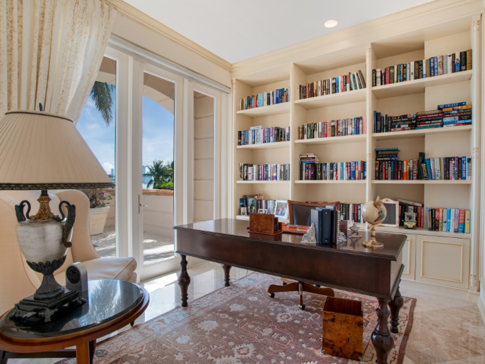 A room that could be a private library or home office opens up to the home