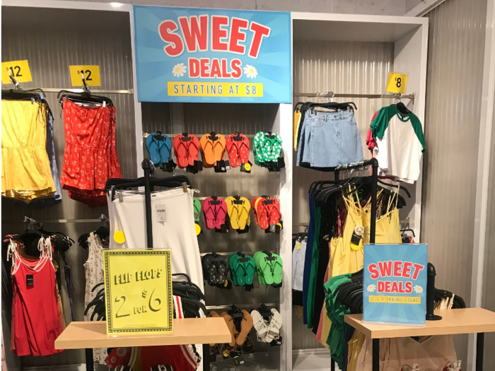 Within just a few minutes we quickly stumbled into a room dedicated to "sweet deal" sales, labeled in aggressively bold colors.