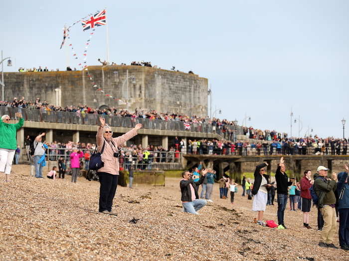 People lined the beach in Portsmouth to see the event.