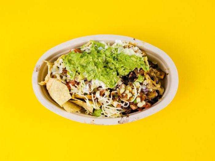 For my nachos, I asked for a chicken burrito bowl with all the free toppings and nachos as the base. I was offered chips on the side instead of on the bottom of the bowl, but I chose to put my toppings where they belong — on top. I also added guac, because guac.