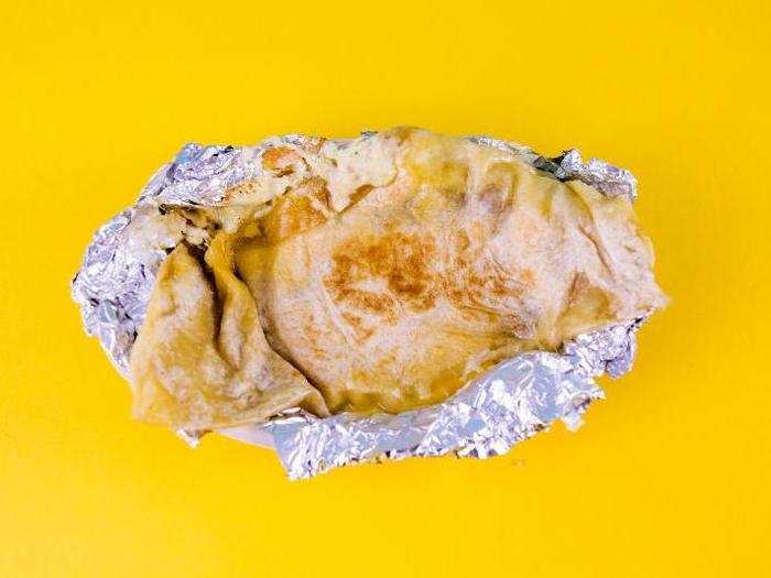 The burritodilla was the most intimidating item out of the wrapper. A quesadilla with half burrito fillings, it practically gushed hot cheese. However, this was the one item that no one at my Chipotle had heard of, so I