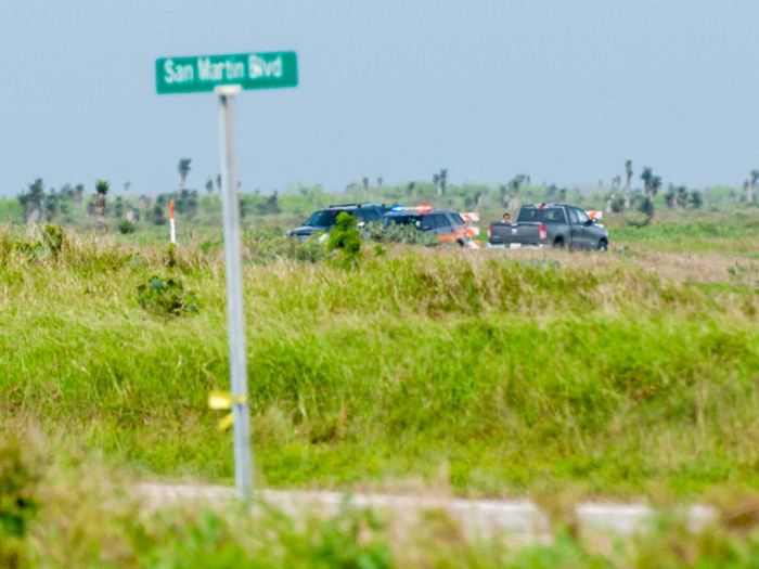 During the launch and engine tests, off-duty police officers hired by SpaceX close off the road to the launchpad and Boca Chica Beach, with the permission of Cameron County