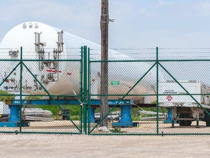 Workers began swarming the area. Some trucked in huge tanks for storing liquid methane. That