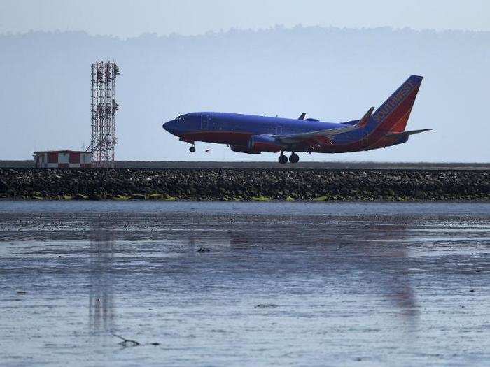 Land near San Francisco International Airport is sinking by up to 1 centimeter per year.