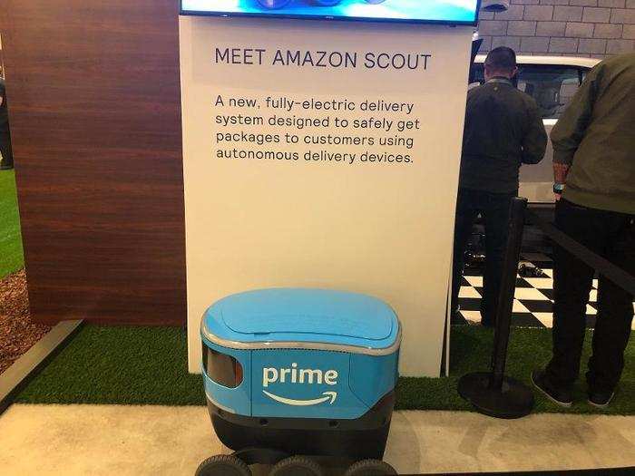 Amazon was showing off its "Scout" robot, too, which Amazon envisions as rolling around neighborhoods delivering packages.