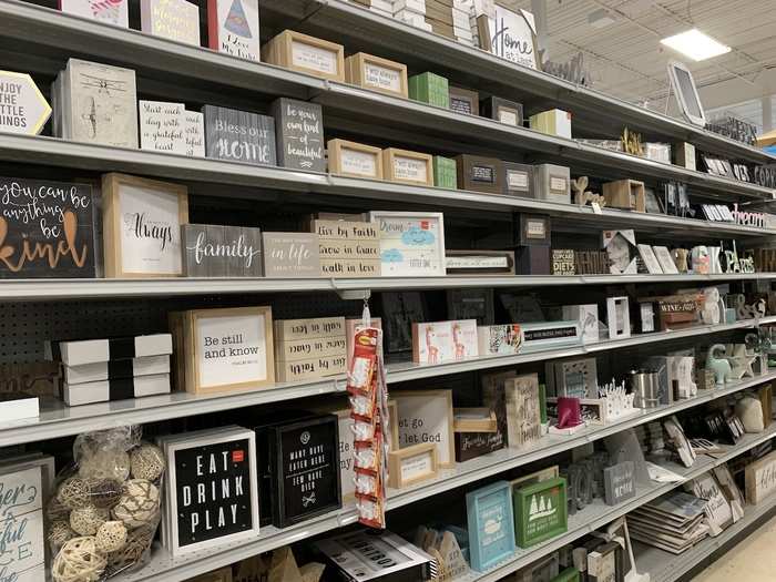 There were many shelves of inspirational quote decor.