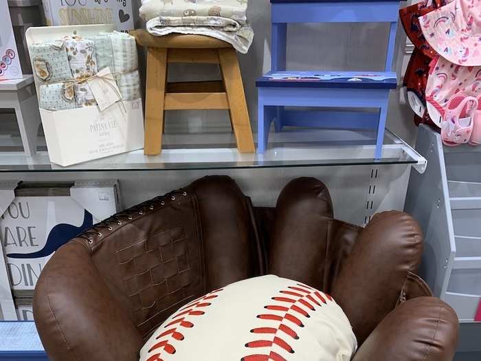 There was a kid-sized chair in the shape of a baseball glove.