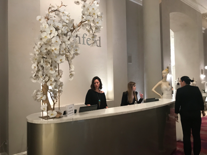 Once you arrive at Kleinfeld, you check in at the front desk before heading back into the store.