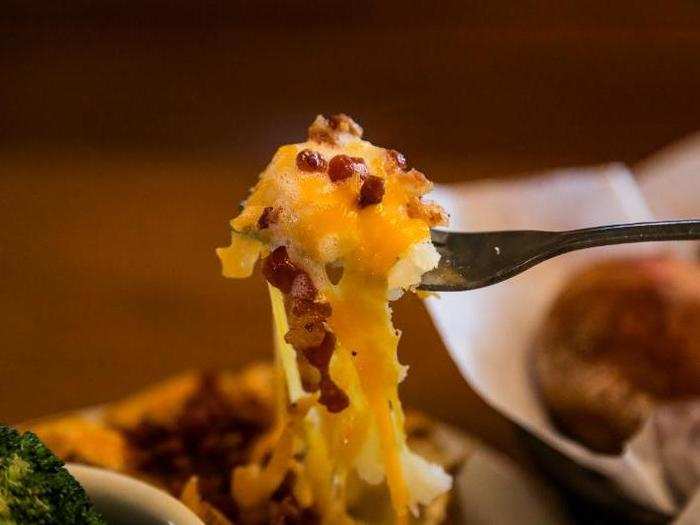 It really was fully loaded. Warm, soft, and incredibly cheesy, this baked potato was a satisfying dish all on its own. I would probably choose mashed potatoes for my side next time, but I
