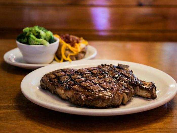 My steak arrived soon after. I ordered a bone-in ribeye steak, medium-rare, with a side of vegetables and a fully loaded baked potato. It cost $24.99.